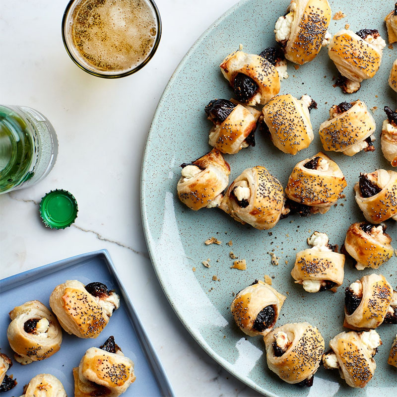  Spicy, honey-glazed figs and creamy goat cheese are baked in puff pastry in this fun vegetarian play on pigs-in-a-blanket. We like the bright tartness of goat cheese, but feel free to substitute brie, Manchego, Parmesan, or Camembert if you prefer.